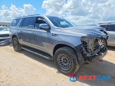 Czwarte zdjęcie samochodu z boku: 2021 GMC YUKON XL K1500 AT4 VIN:1GKS2HKDXMR445238 - miniatura