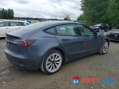 Trzecie zdjęcie samochodu z tyłu: 2022 TESLA MODEL 3 VIN:5YJ3E1EA8NF369347 - miniatura