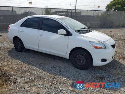 Czwarte zdjęcie samochodu z boku: 2009 TOYOTA YARIS BASE VIN:JTDBT903X91321095 - miniatura