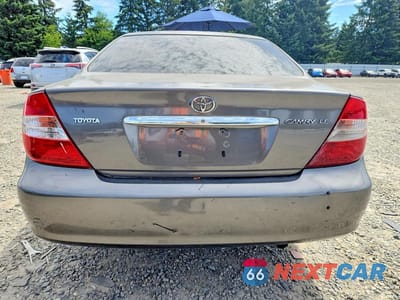 Zdjęcie 6 z 12 samochodu: 2004 TOYOTA CAMRY LE VIN:JTDBE32K340297653 - miniatura