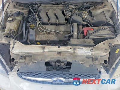 Zdjęcie 11 z 12 samochodu: 2002 FORD TAURUS SES VIN:1FAFP55SX2A110652 - miniatura