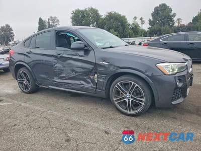 Czwarte zdjęcie samochodu z boku: 2015 BMW X4 XDRIVE28I VIN:5UXXW3C54F0M89290 - miniatura