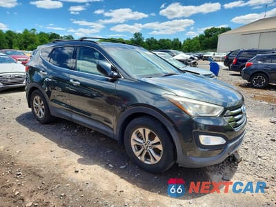 Czwarte zdjęcie samochodu z boku: 2014 HYUNDAI SANTA FE SPORT 2.4L VIN:5XYZU3LB2EG154785 - miniatura