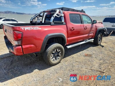 Trzecie zdjęcie samochodu z tyłu: 2019 TOYOTA TACOMA SR5 VIN:5TFAZ5CN6KX074869 - miniatura