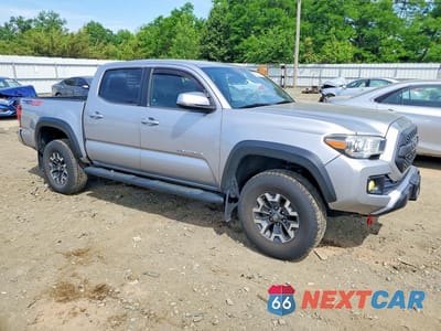 Czwarte zdjęcie samochodu z boku: 2018 TOYOTA TACOMA TRD OFF-ROAD VIN:3TMCZ5AN5JM149299 - miniatura