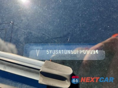 Zdjęcie 12 z 12 samochodu: 2013 TESLA MODEL S VIN:5YJSA1DN5DFP09094 - miniatura