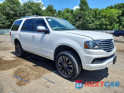 Czwarte zdjęcie samochodu z boku: 2015 LINCOLN NAVIGATOR VIN:5LMJJ2HT6FEJ02757 - miniatura