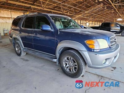 Czwarte zdjęcie samochodu z boku: 2004 TOYOTA SEQUOIA SR5 VIN:5TDZT34A04S237111 - miniatura