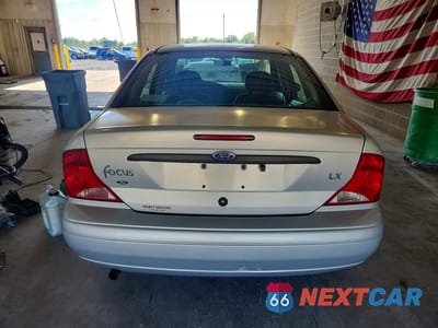 Zdjęcie 6 z 13 samochodu: 2000 FORD FOCUS LX VIN:1FAFP33P1YW346931 - miniatura