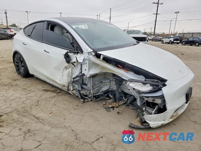 Czwarte zdjęcie samochodu z boku: 2022 TESLA MODEL Y VIN:7SAYGDEF3NF560870 - miniatura