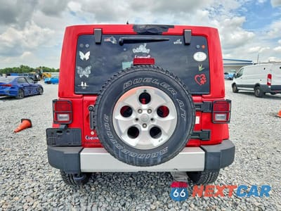 Zdjęcie 6 z 12 samochodu: 2015 JEEP WRANGLER UNLIMITED SAHARA VIN:1C4BJWEGXFL527971 - miniatura