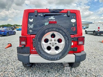 Zdjęcie 6 z 12 samochodu: 2015 JEEP WRANGLER UNLIMITED SAHARA VIN:1C4BJWEGXFL527971 - miniatura