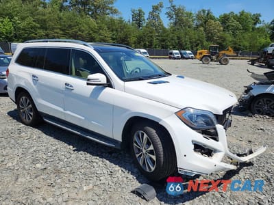 Czwarte zdjęcie samochodu z boku: 2016 MERCEDES-BENZ GL 450 4MATIC VIN:4JGDF6EE3GA712574 - miniatura