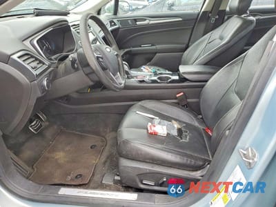 Zdjęcie 7 z 12 samochodu: 2014 FORD FUSION TITANIUM PHEV VIN:3FA6P0SU9ER122505 - miniatura