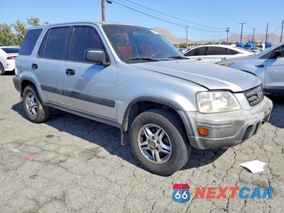 Czwarte zdjęcie samochodu z boku: 1997 HONDA CR-V LX VIN:JHLRD1855VC069860 - miniatura