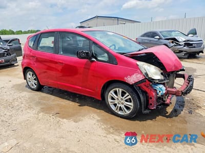 Czwarte zdjęcie samochodu z boku: 2010 HONDA FIT SPORT VIN:JHMGE8G41AC002426 - miniatura