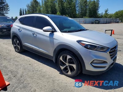 Czwarte zdjęcie samochodu z boku: 2016 HYUNDAI TUCSON LIMITED VIN:KM8J3CA22GU118899 - miniatura
