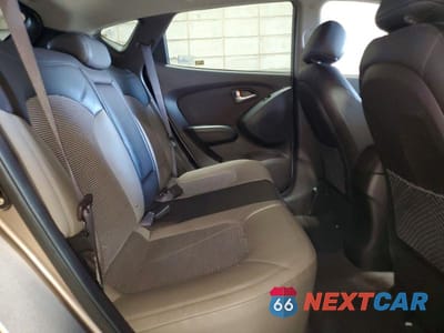 Zdjęcie 11 z 14 samochodu: 2011 HYUNDAI TUCSON GLS VIN:KM8JUCAC8BU136449 - miniatura