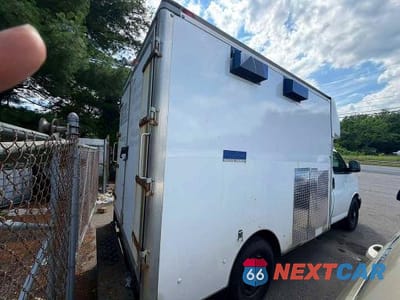 Trzecie zdjęcie samochodu z tyłu: 2014 CHEVROLET EXPRESS G3500 VIN:1GB0G2BA1E1172167 - miniatura