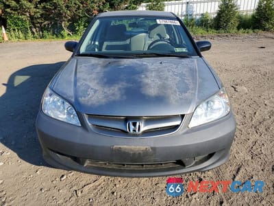 Piąte zdjęcie samochodu w środku: 2005 HONDA CIVIC DX VP VIN:2HGES163X5H571846 - miniatura