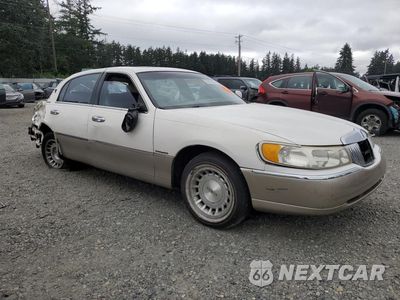 Czwarte zdjęcie samochodu z boku: 1999 LINCOLN TOWN CAR EXECUTIVE VIN:1LNHM81W8XY685378 - miniatura