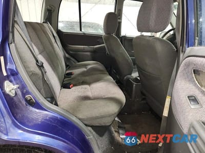 Zdjęcie 11 z 13 samochodu: 1999 CHEVROLET TRACKER VIN:2CNBJ13C0X6932410 - miniatura