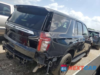 Trzecie zdjęcie samochodu z tyłu: 2023 CHEVROLET TAHOE C1500 VIN:1GNSCLED6PR231009 - miniatura