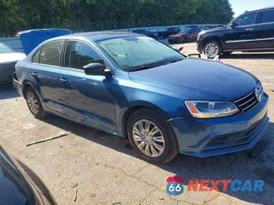Czwarte zdjęcie samochodu z boku: 2016 VOLKSWAGEN JETTA S VIN:3VW267AJ8GM269097 - miniatura