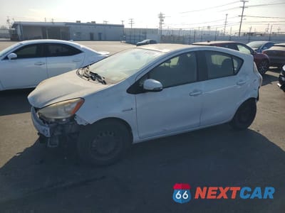 2014 TOYOTA PRIUS C THREE JTDKDTB36E1069718 - główne zdjęcie licytacji z USA - miniatura