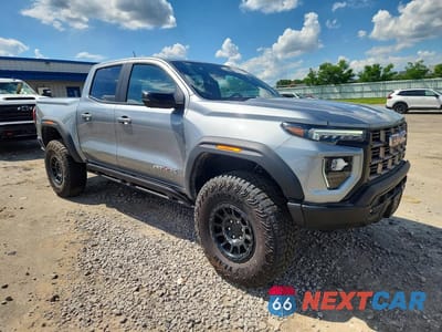 Czwarte zdjęcie samochodu z boku: 2024 GMC CANYON AT4X VIN:1GTP6EEK7R1205259 - miniatura