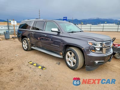 Czwarte zdjęcie samochodu z boku: 2015 CHEVROLET SUBURBAN K1500 LTZ VIN:1GNSKKKC7FR243998 - miniatura