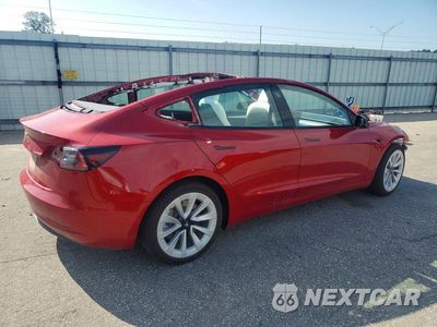 Trzecie zdjęcie samochodu z tyłu: 2022 TESLA MODEL 3 VIN:5YJ3E1EA2NF347098 - miniatura