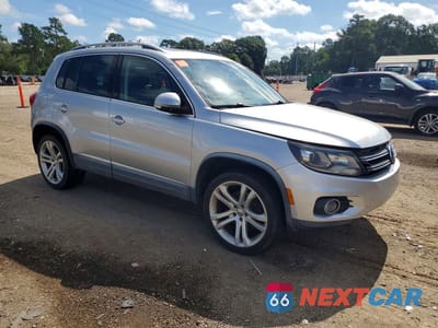 Czwarte zdjęcie samochodu z boku: 2016 VOLKSWAGEN TIGUAN S VIN:WVGAV7AX9GW554280 - miniatura