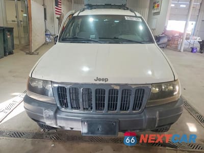 Piąte zdjęcie samochodu w środku: 2001 JEEP GRAND CHEROKEE LAREDO VIN:1J4GW48S21C686417 - miniatura