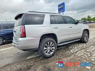 Trzecie zdjęcie samochodu z tyłu: 2020 GMC YUKON SLE VIN:1GKS2AKC8LR210611 - miniatura