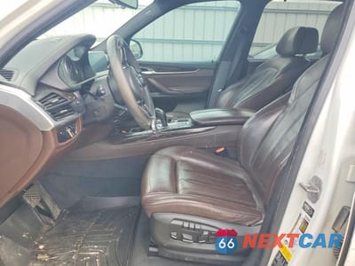 Zdjęcie 7 z 12 samochodu: 2014 BMW X5 XDRIVE50I VIN:5UXKR6C57E0J72170 - miniatura