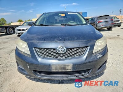 Piąte zdjęcie samochodu w środku: 2010 TOYOTA COROLLA LE VIN:1NXBU4EE3AZ269463 - miniatura