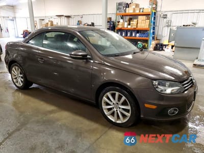 Czwarte zdjęcie samochodu z boku: 2013 VOLKSWAGEN EOS KOMFORT VIN:WVWBW8AH1DV008028 - miniatura