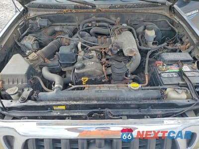Zdjęcie 11 z 12 samochodu: 2004 TOYOTA TACOMA XTRACAB VIN:5TEWM72N64Z377356 - miniatura