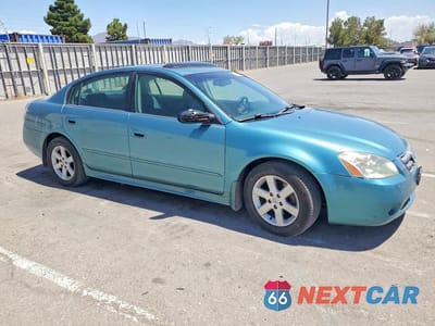 Czwarte zdjęcie samochodu z boku: 2003 NISSAN ALTIMA 2.5 S VIN:1N4AL11E43C228944 - miniatura