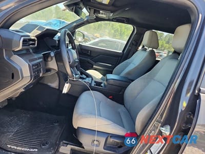 Zdjęcie 7 z 13 samochodu: 2024 TOYOTA TACOMA SR5 VIN:3TMKB5FN8RM022275 - miniatura