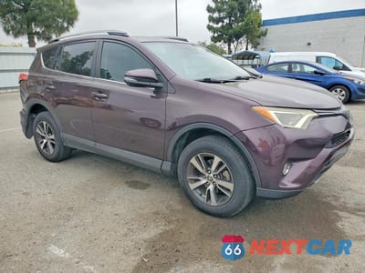 Czwarte zdjęcie samochodu z boku: 2017 TOYOTA RAV4 XLE VIN:2T3WFREV2HW331820 - miniatura