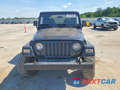 Piąte zdjęcie samochodu w środku: 2000 JEEP WRANGLER / TJ SPORT VIN:1J4FA49S0YP707891 - miniatura