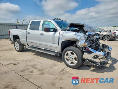 Czwarte zdjęcie samochodu z boku: 2015 CHEVROLET SILVERADO K2500 HEAVY DUTY LTZ VIN:1GC1KWE81FF670114 - miniatura