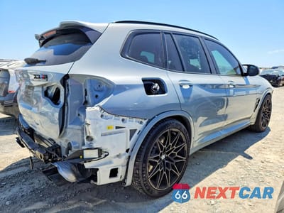 Trzecie zdjęcie samochodu z tyłu: 2022 BMW X3 M VIN:5YM13EC01N9K66769 - miniatura