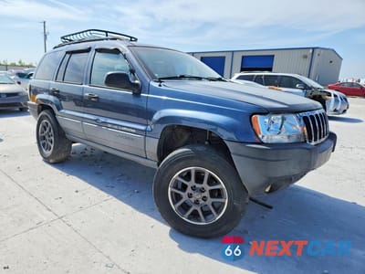 Czwarte zdjęcie samochodu z boku: 2002 JEEP GRAND CHEROKEE LAREDO VIN:1J4GW48S62C223679 - miniatura