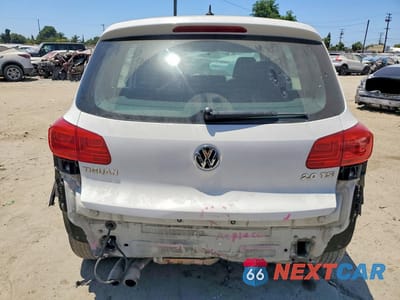 Zdjęcie 6 z 13 samochodu: 2013 VOLKSWAGEN TIGUAN S VIN:WVGAV3AX3DW609732 - miniatura