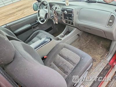 Zdjęcie 8 z 12 samochodu: 2003 FORD EXPLORER SPORT VIN:1FMZU70E03UC04838 - miniatura