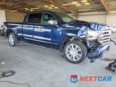 Czwarte zdjęcie samochodu z boku: 2022 CHEVROLET SILVERADO K1500 HIGH COUNTRY VIN:1GCUDJET1NZ587049 - miniatura