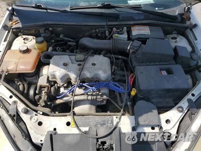 Zdjęcie 11 z 12 samochodu: 2000 FORD FOCUS LX VIN:1FAFP33P9YW209865 - miniatura